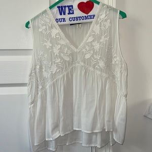 Size medium blue rain white top with floral white flower patching
